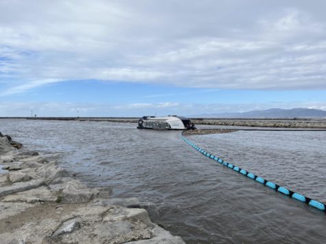 The Ocean Cleanup Interceptor cleaning a river